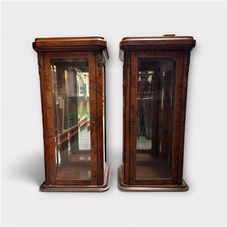 A set of display cabinets, ca. 1920. Marble tops are missing.