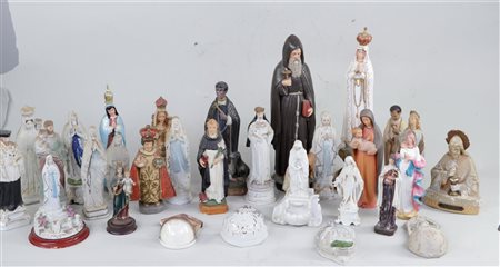 A large lot of statues of saints and holy water fonts.