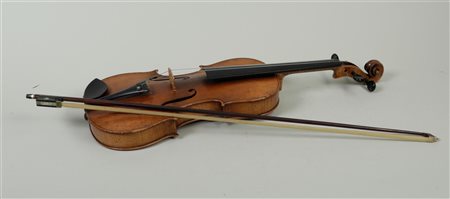 A practice violin, bears label 'Stradivarius' (on the inside), first half...