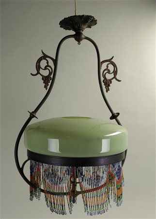 An arte noveau pendant lamp with glass beads.Diam. 40 cm.