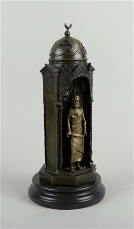 A bronze statue of a lady and an Arab in a dome tower, in Bergmann style.H....