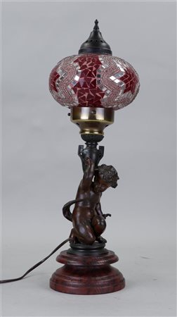 An antique composition metal figure of a putomet lamp. France. Circa 1900.H....