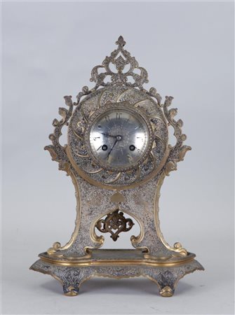 A brass pendulum clock, made for the Persian market. late 19th century.37 x...