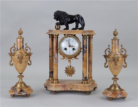 A marble garniture cheminée with a dark patinated statue of the Medici lion....