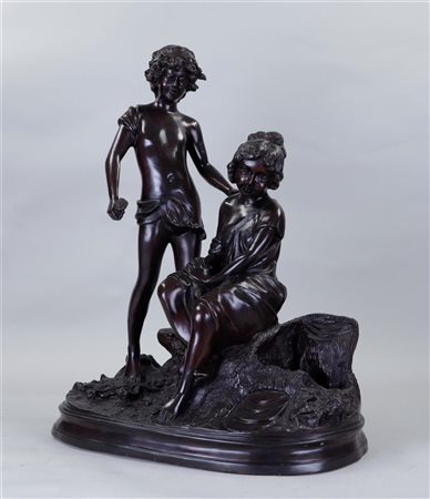 A large dark patinated bronze sculpture of a couple in love.57 x 44 cm.