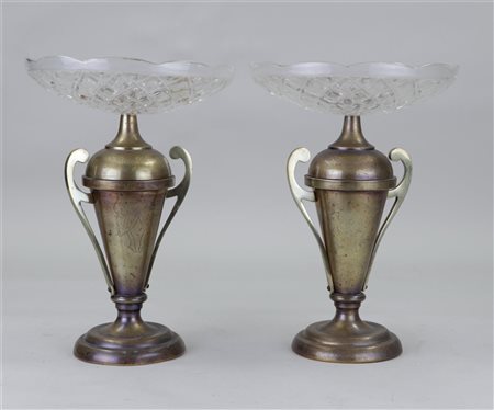 A set of two glass bowls on brass base. Early 20th century.H. 30 cm.