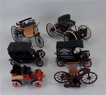 A collection of Franklin Mint scale model antique vehicles.