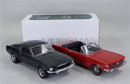 Two 1:18 scale model Ford Mustangs by Norev and Ertl.