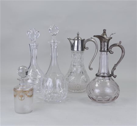 A lot of five assorted crystal decanters.