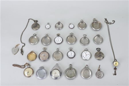 lot of various pocket watches and pocket watch parts.