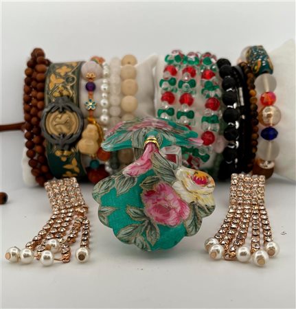 A lot of various jewelry including bead necklaces.