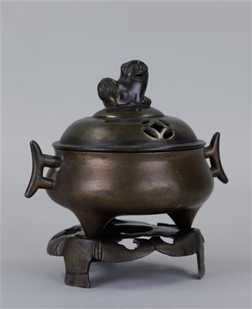 A bronze incense burner on a foot, marked on the bottom. China, circa 1900.16...