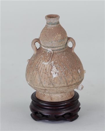 A stoneware amphora, sea find. 15th century?H. 13 cm.