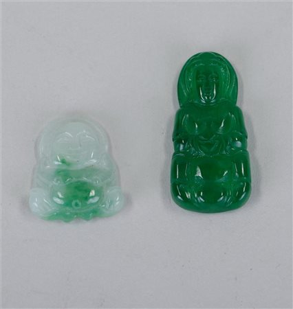 A lot of two jade amulets. China, 20th century.