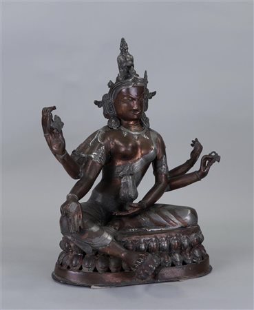 A decorative bronze sculpture of a seated Vasudhara, Nepal, 2nd half of the...