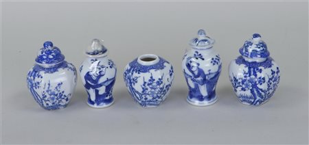 Collection of five blue and white angled lidded jars and two baluster vases...