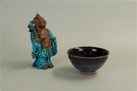 A lot consisting of a Chinese bowl, and a happy Buddha, China 19th century....