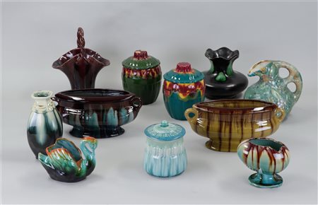 A collection of various Flemish pottery including jardinaires and jugs.