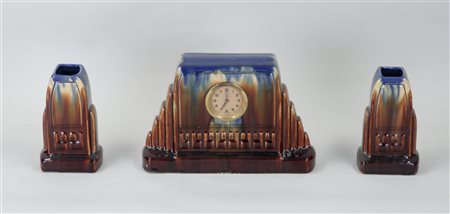 A Flemish earthenware blue glazed Art Deco mantelpiece set.H. 22 cm.