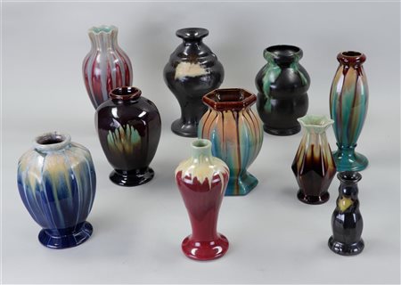 A collection of ten glazed Flemish earthenware vases.H. 10 - 26 cm.