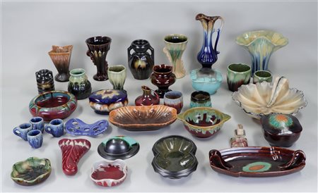 A lot of various glazed Flemish pottery including jugs, vases and bowls.