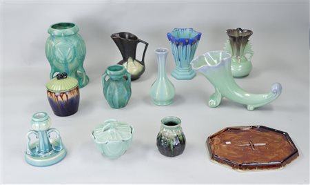 A lot of various glazed Flemish pottery including jugs and vases.