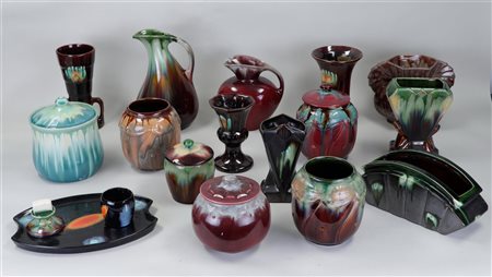 A lot of various glazed Flemish pottery including jugs and vases.