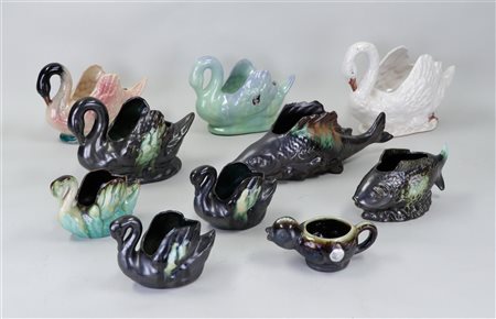 A collection of various glazed Flemish pottery animal figures.