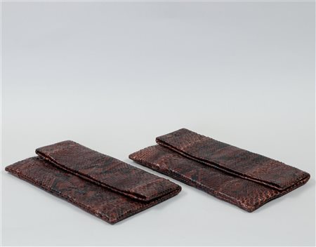 A lot of two snakeskin clutches. First half 20th century. B. 30 cm.