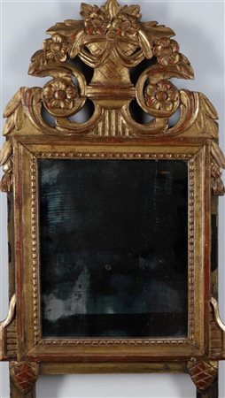 An antique Louis XVI carved wooden and gold leaf wall mirror, 68 x 36 cm.