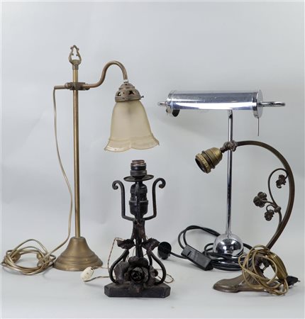 A lot of four various table and desk lamps.