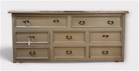 A green/grey lacquered softwood sideboard with two large and six small...