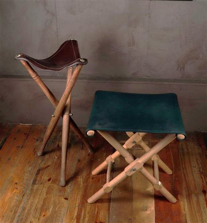 A lot consisting of two folding stools with leather seat. One of them is a...