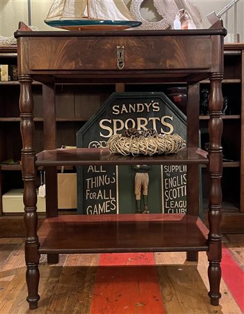 An English, mahogany etagere with drawer on turned legs. NB: The attributes...