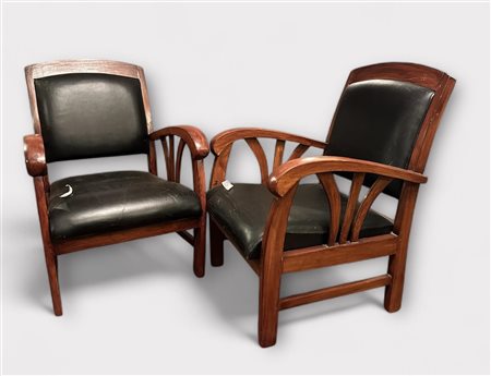 A set of two Art Deco teak club chairs, seat height 40 cm.