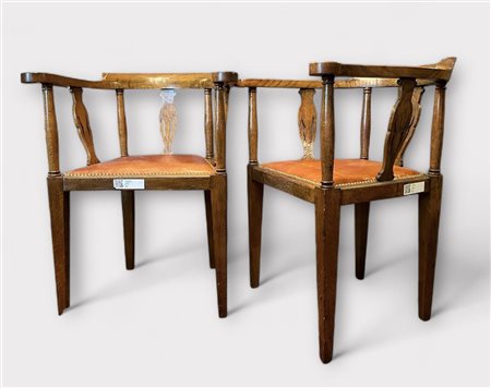 A set of (2) oak horseshoe chairs with cognac leather upholstery, ca. 19th...