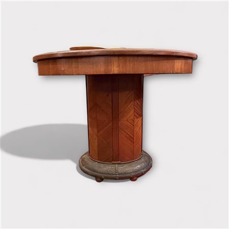 A diamond veneered, kidney shaped, Art Deco coffee table on a chased copper...