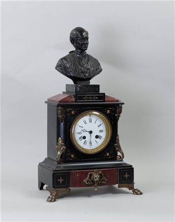 A marble mantel clock with brass ornaments, with added a bronze bust of Leo...