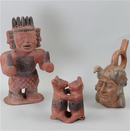 A lot of three Mexican terracotta figures.