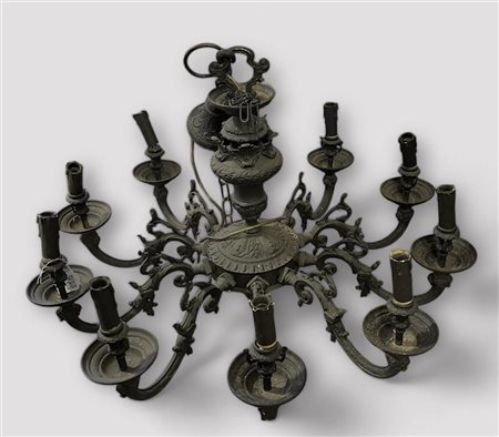 A ten-arm cast iron chandelier converted from gas to electricity, France ca....