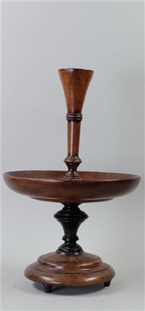 A turned wooden fruit bowl, 19th century. Height: 46 cm., Diam. 27 cm.