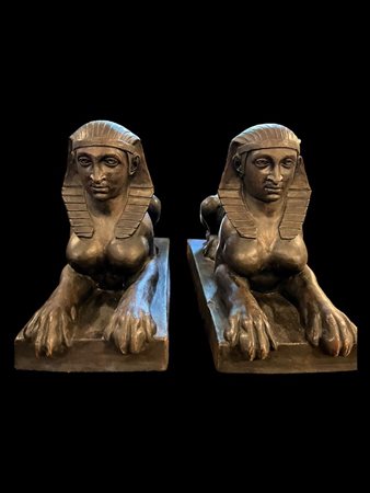 Two large patinated Italian terracotta Sphinxes, marked Impruneta. 42 x 60 cm.