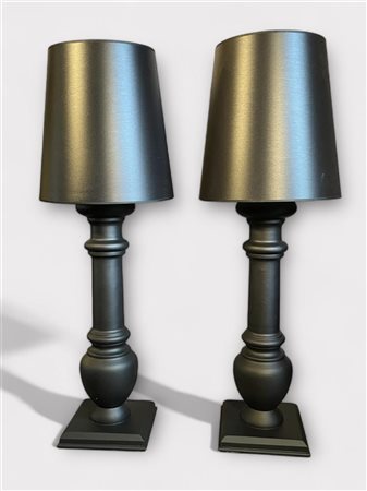 A set of black lacquered wooden table lamps with a black shade. H. 115 cm.