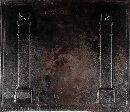 A black painted cast iron fireplace plate with two columns depicted on it. 58...