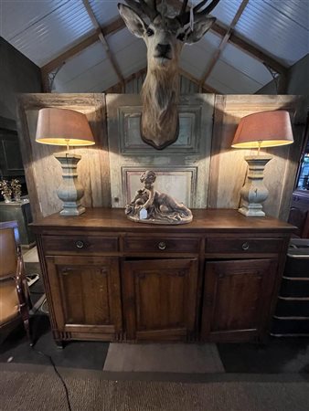 A large oak sideboard with three doors and three drawers, Flanders ca....