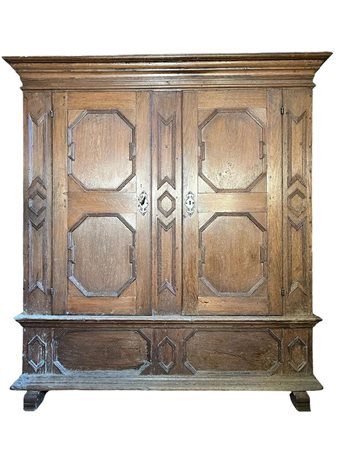 A German oak bread cupboard / linen cupboard, with two doors with shelves...