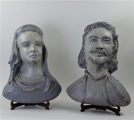 Two 'folk art' painted papier mache wall busts of a lady and a gentleman,...