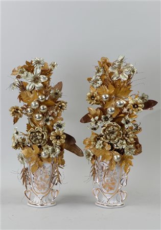 Two French porcelain vases with golden artificial flowers. Late 19th century....