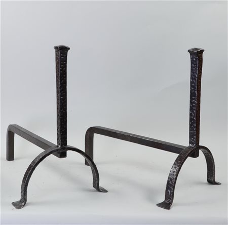 A pair of antique wrought iron fire dogs. 38 x 39 cm.