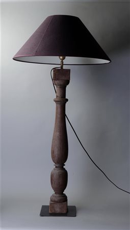 A piece of furniture made into a table lamp with a blue-purple shade. 20th...